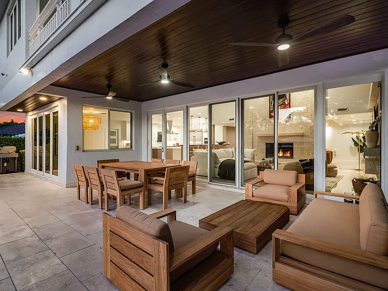 Spacious outdoor lounge designed for easy conversations and laid-back gatherings by the pool.