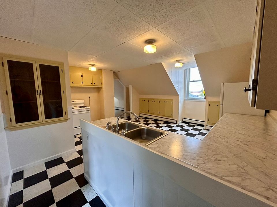 New countertops and VCT checkerboard floor