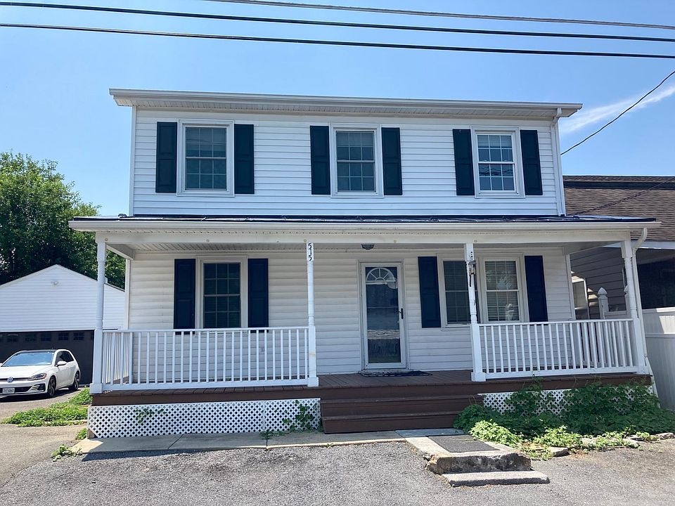 Enjoy the quiet neighborhood from your front porch. Park in front of your unit, too.