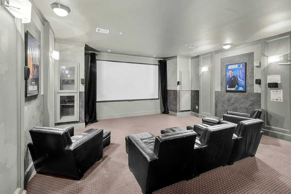 Watch your favorite films in the community movie theater at The Quarters, off-campus student apartments near UL Lafayette. - The Quarters