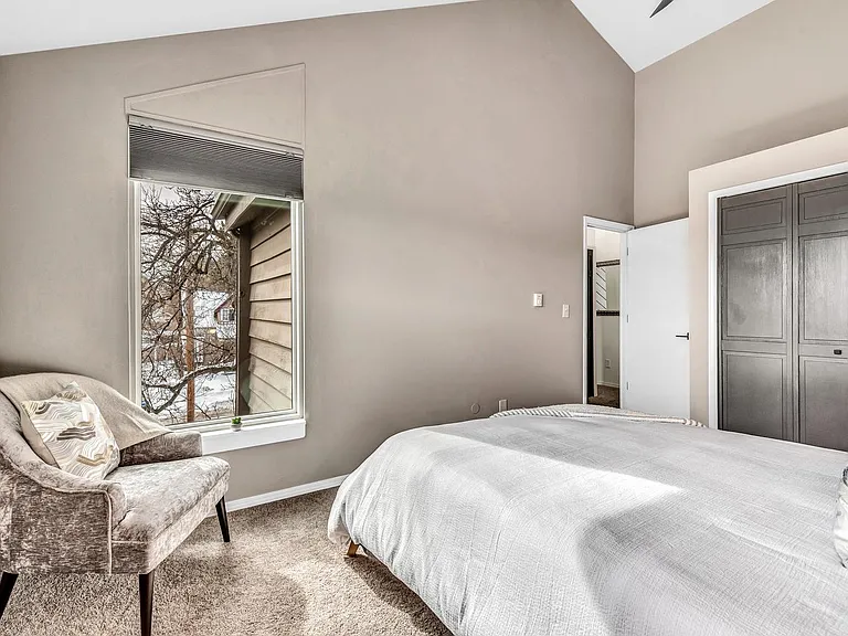 2nd bedroom with queen bed and work station