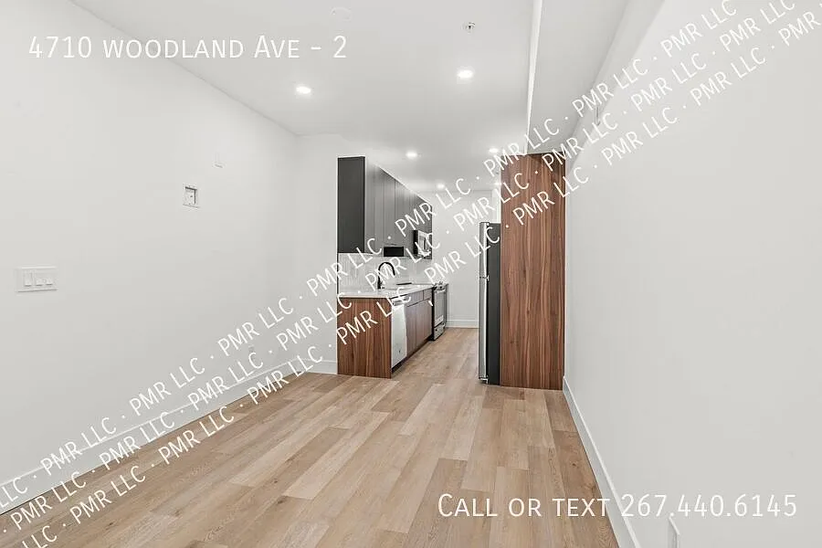 Modern 2BR/2BA with Private Rear Deck Near Clark Park — Photo 4