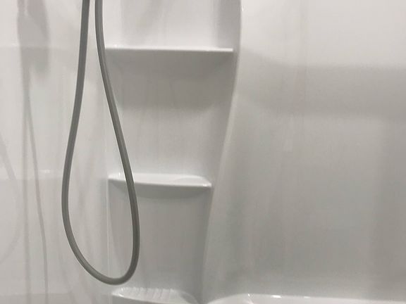 Remodeled bathroom with tub.