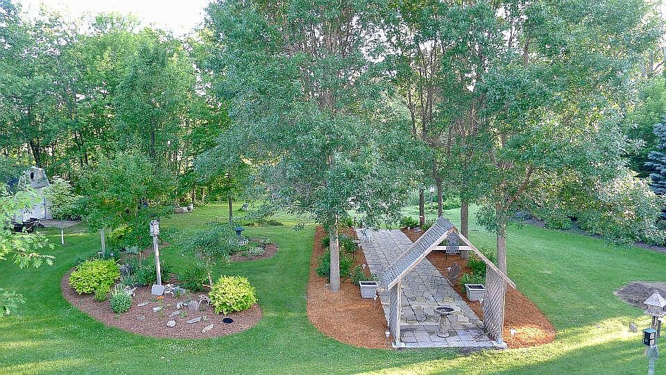 View of backyard to pond