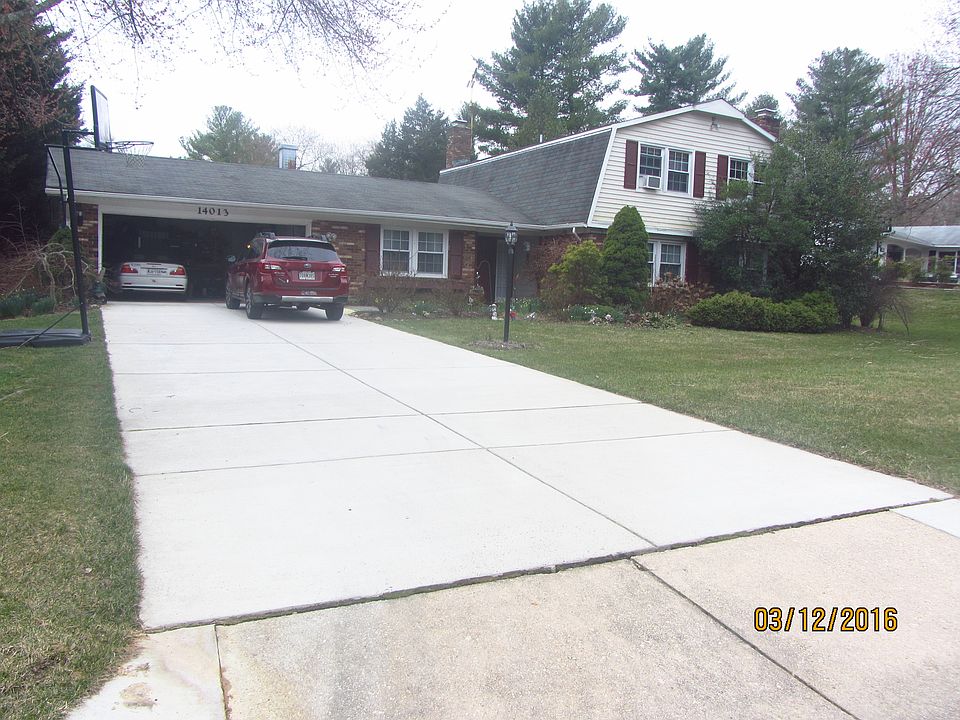 Front new concrete driveway