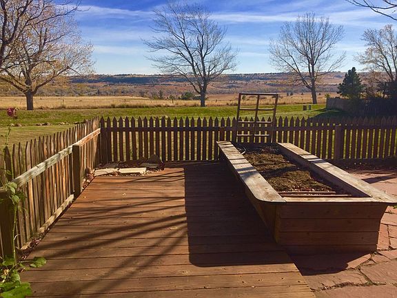 back deck w/ raised flower bed fall