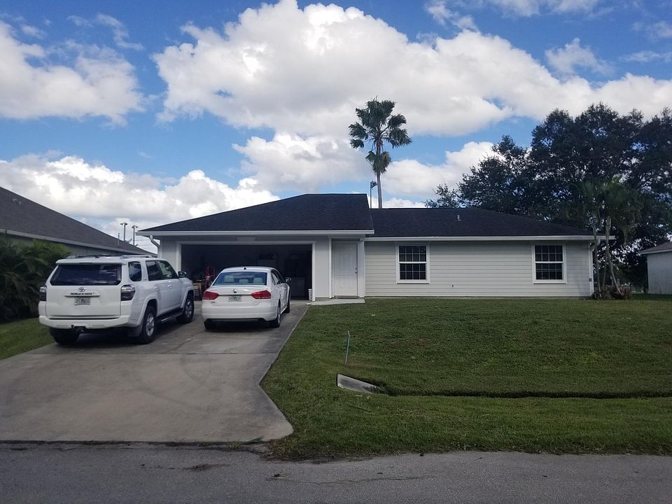 Front yard and large garage