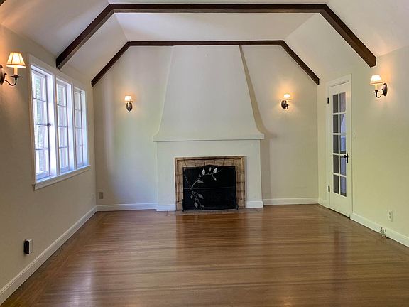 Living room - vaulted ceiling and fireplace.