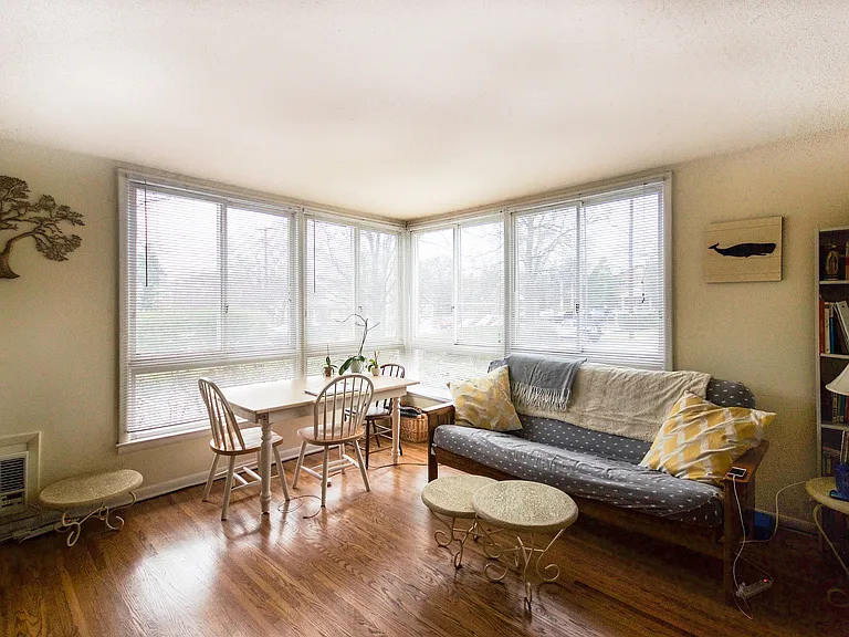 Experience warmth and comfort in this sunlit corner living area.