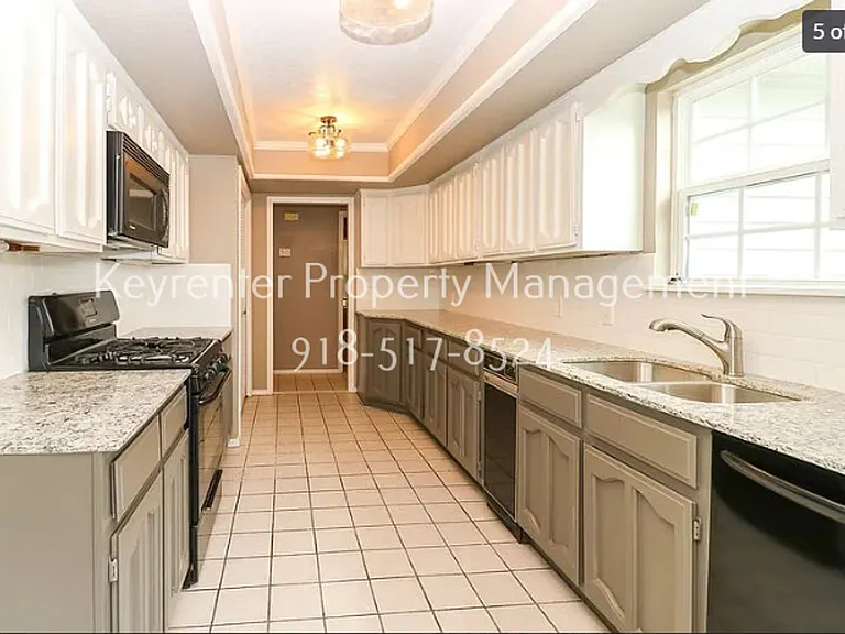 7737 S Trenton Ave — Photo 5