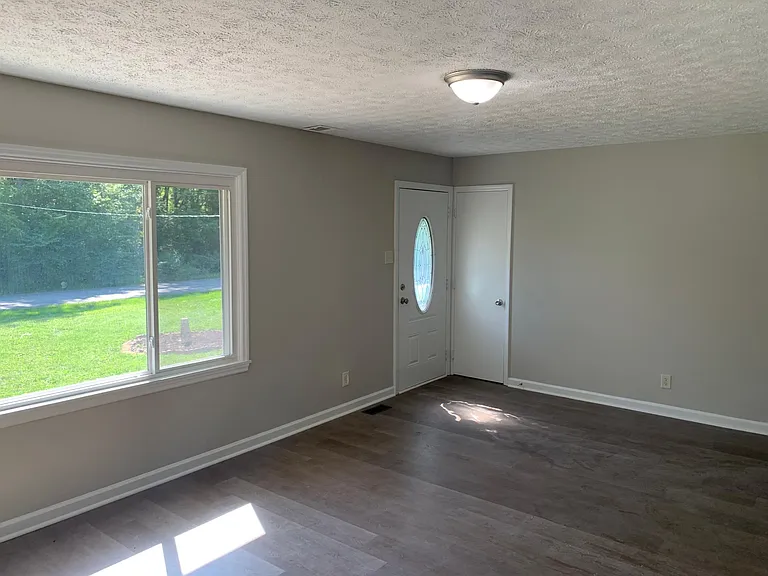 Large living room drenched with sunlight