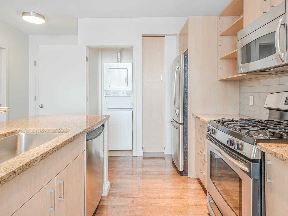 Kitchen with Granite Countertops and Stainless Steel Applian
