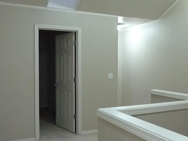 Computer den with vaulted ceiling and skyline