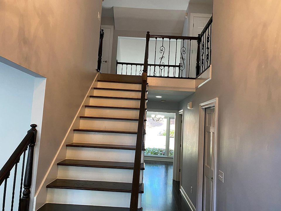 View from Front Door - stairs and hallway