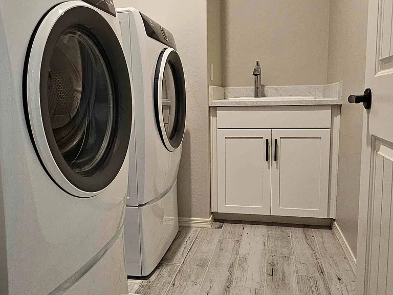 Laundry room with sink