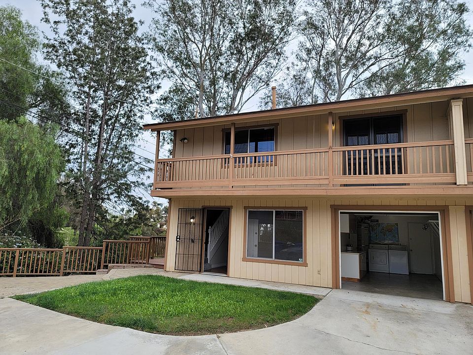 2 Story Townhome with attached garage and additional parking spot in front