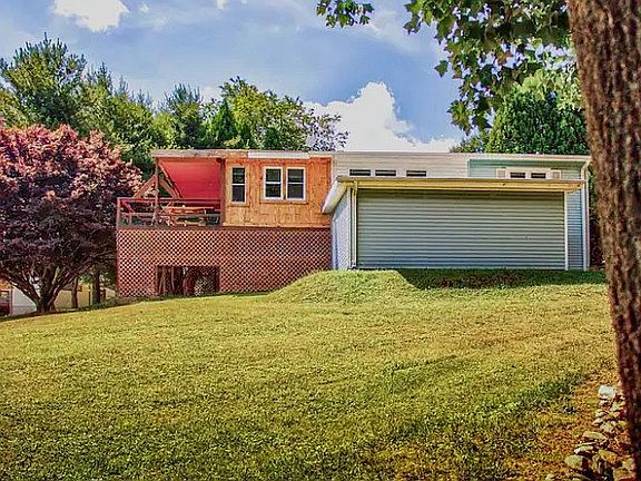 Back view of house, workshed