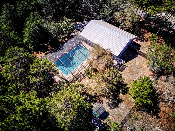 Aerial view of home/pool