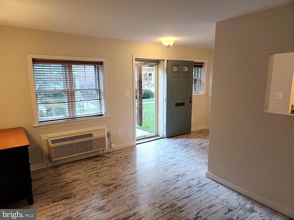 Two big windows keep this studio nice and bright