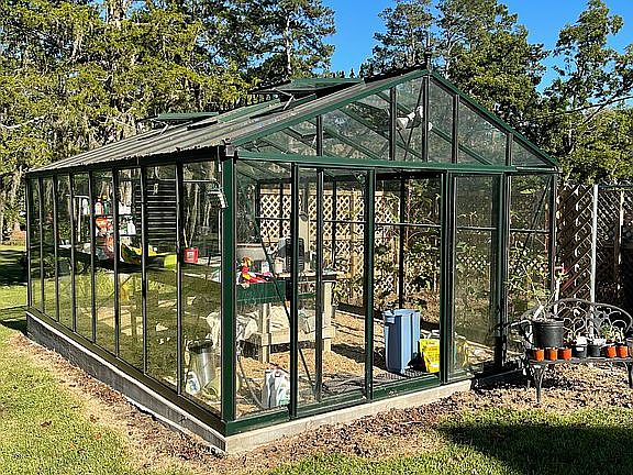 Greenhouse Adjacent to House