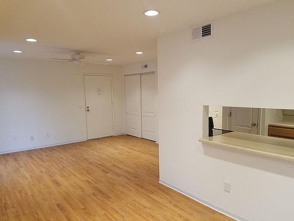 View into front door and window into kitchen