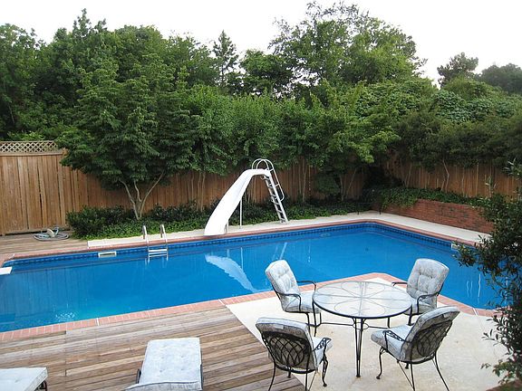 L-Shaped Pool With Slide and Diving Board
