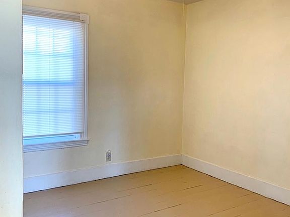 Bedroom off of living room.