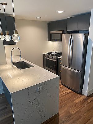 1st image of 22 E 1st St APT 410