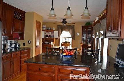 Kitchen
						:
						Kitchen looking to eating area