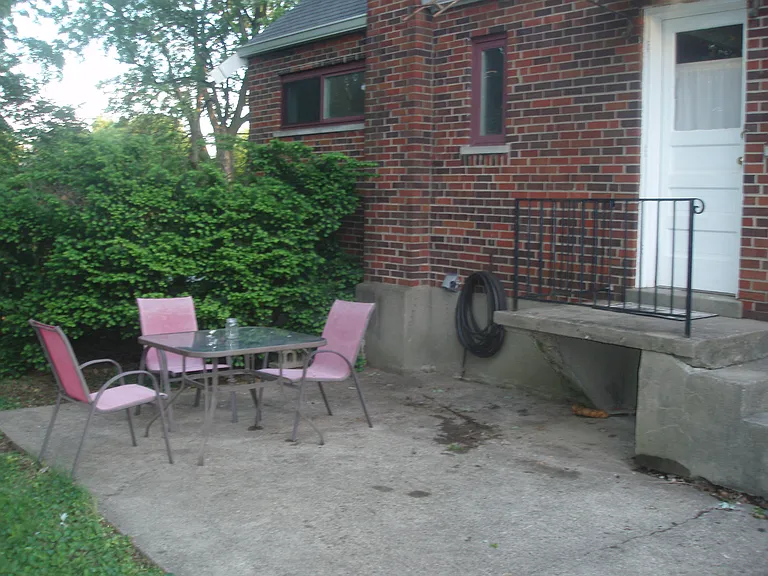 side patio, patio furniture does stay on site for tenants use.