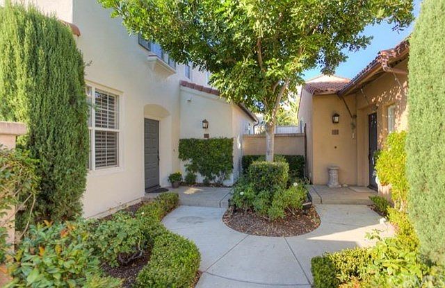 Lovely courtyard entry. Front landscape is maintained by the HOA.