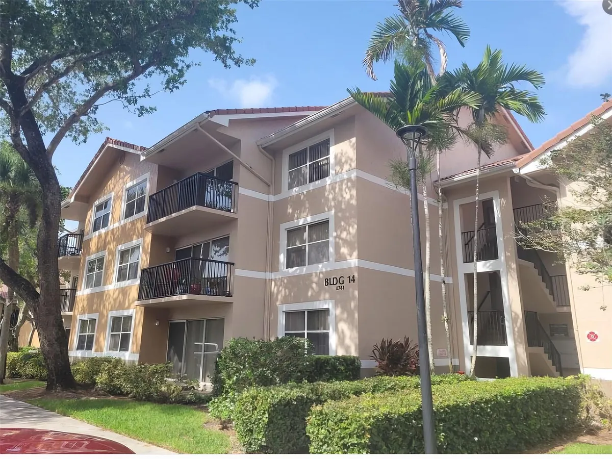 Building Photo - 8741 Wiles Rd #305