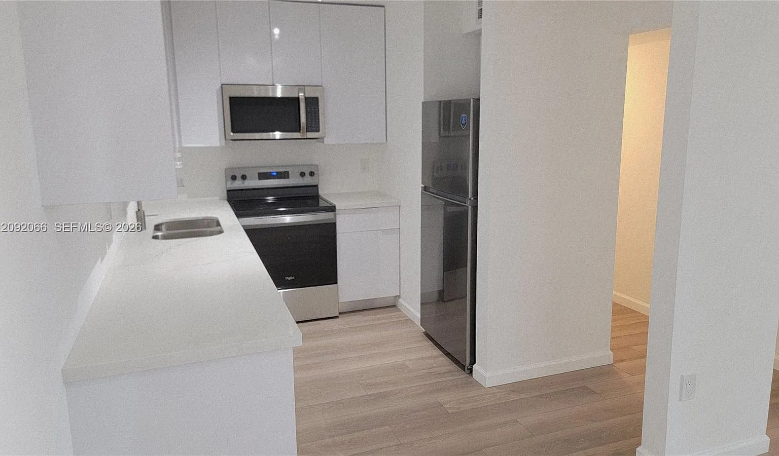 Belinda Gardens Condo — Photo 4