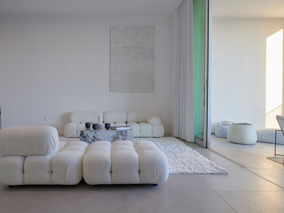 Indoor-Outdoor Harmony with Seamless Glass Doors _ Experience the pinnacle of California luxury living with an effortless connection between indoor serenity and outdoor relaxation, all within the exclusive setting of Asteras Kings.