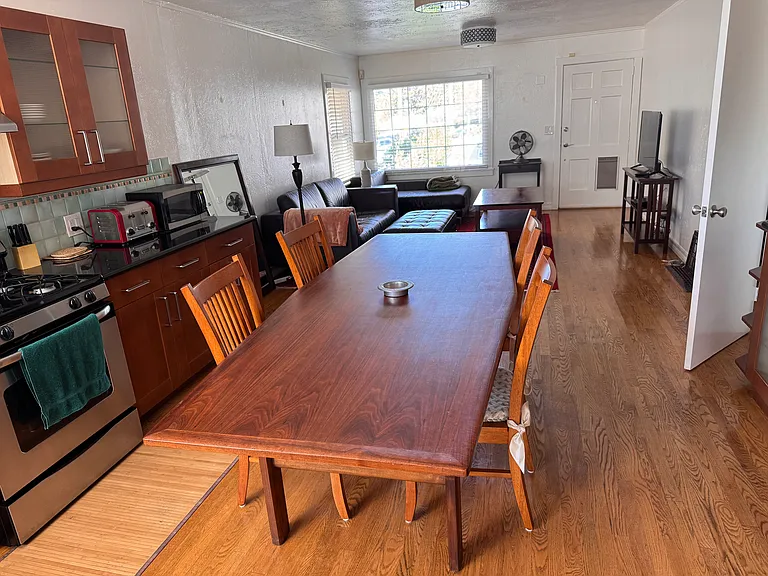 View from kitchen toward the living room. Bedrooms are through the door on the right.