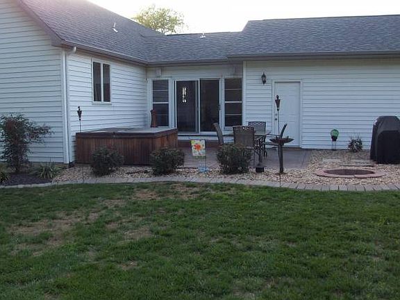 Back patio with hot tub