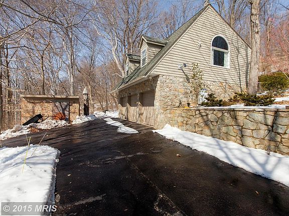 90' Stone Retaining Wall; 3-Car Detached Garage
