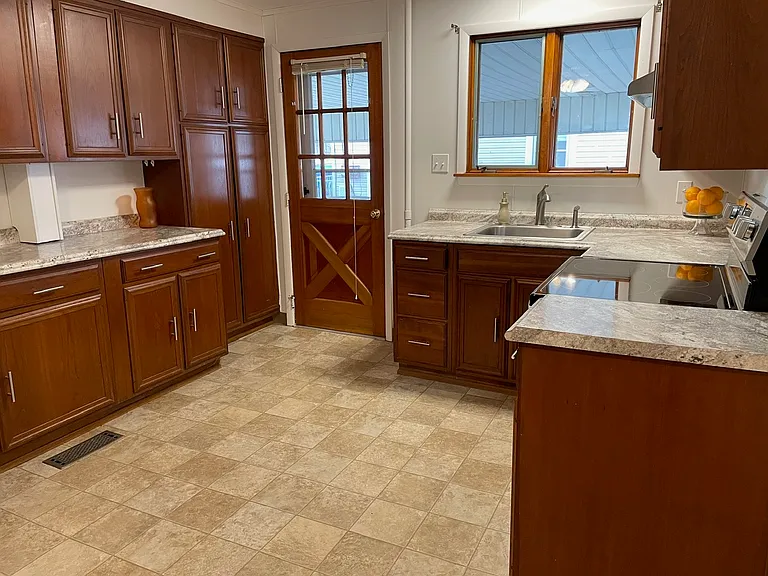 Abundant, Beautiful Wood Cabinets and Counter Space, Central Air Conditioning and Central Heat