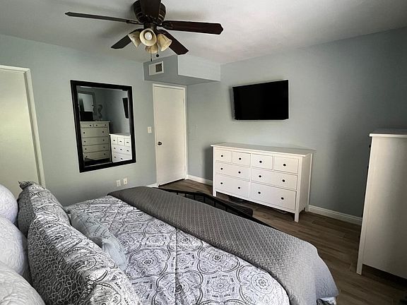 Spacious Bedroom - Walk-in closet door is shown on the left.