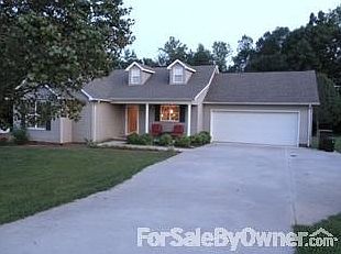 Front View
						:
						Expanded driveway for additional parking