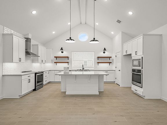 Kitchen with center island and pendant lighting