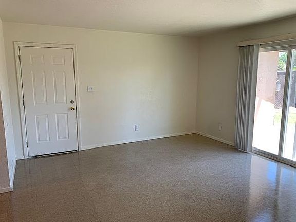 inside living room with front door closed