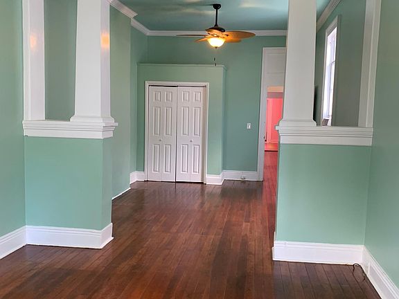 Front parlour and pass-through bedroom #1 with closet.