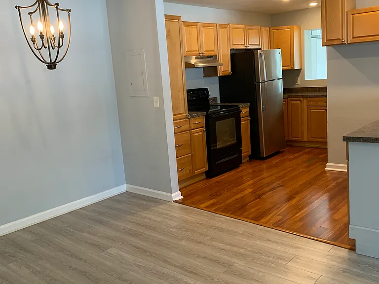 Back to open living space of living room/dining room/kitchen/sunroom