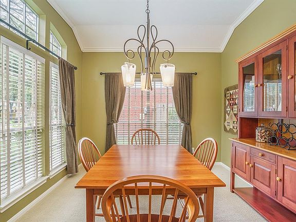 Formal dining room has lots of natural light