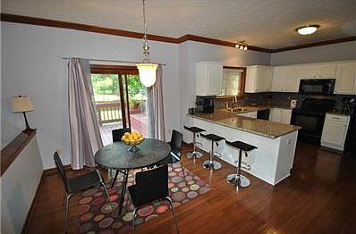 The kitchen has new granite counters and a great breakfast bar.