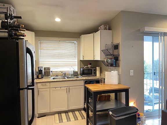 Kitchen - and slider to balcony.