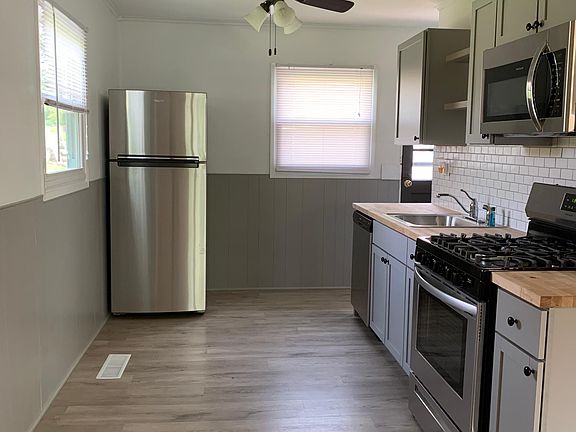 Updated kitchen with all new stainless steel appliances.