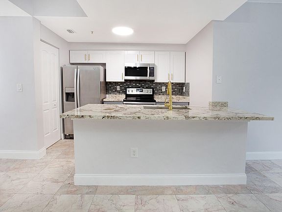 2nd image of 5860 W Sample Road #204