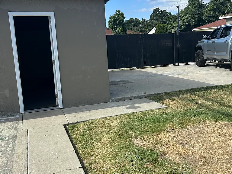 Back yard grass area parking Not allowed, concrete area fine